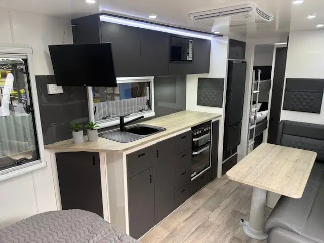 Kitchen and café dinette inside the Cruiser 2110MD