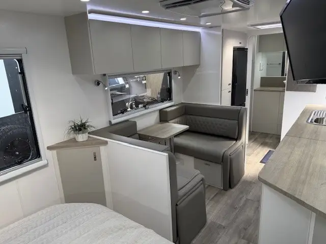 Lounge and bed inside the Cruiser 216R